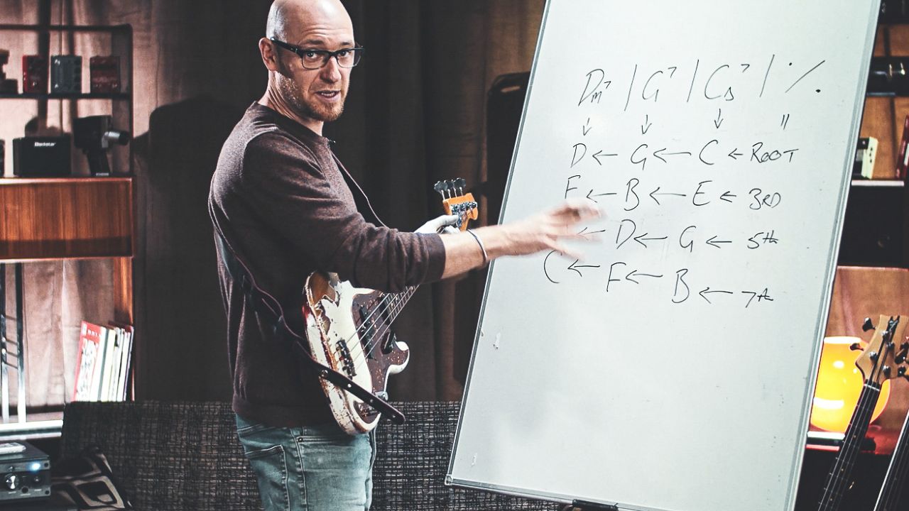 Scott drawing on a whiteboard